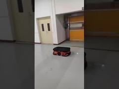 AGVが物品エアシャワーを通過 | 管理された環境での自動マテリアルハンドリング